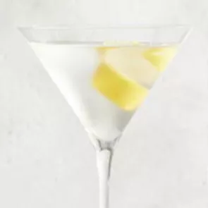 A glass of Haku® Martini garnished with Lemon Peel