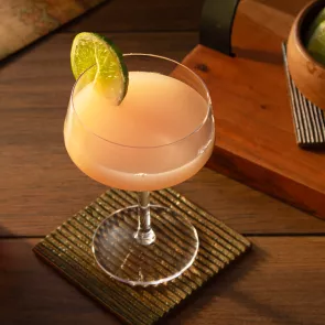 A glass of Hemingway Daiquiri garnished with Lime Wheel 