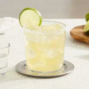 A glass of Hornitos® Shot-Taker Margarita garnished with Lime Wheel