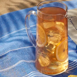 A glass of LemonWedge garnished with LemonWedge 