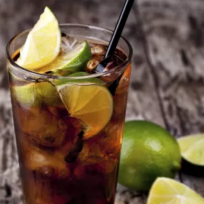 Image of glass filled with cuba libre and lots of fruit