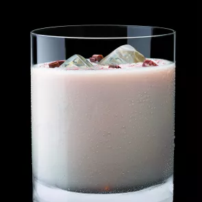 a glass of Maker's (Non-Egg) Nog with ice cubes and chocolate