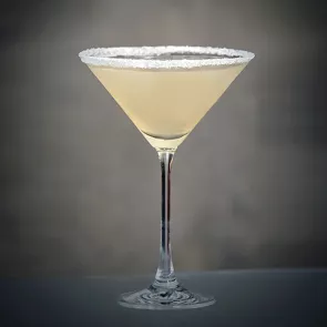 a martini glass of first class